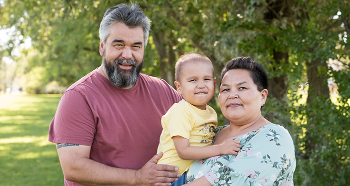 Pierre, Josiah and Susan in cuddle hug